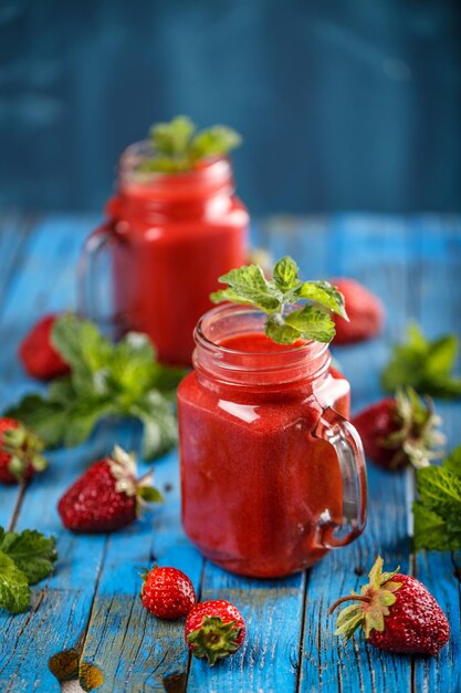 Glasses of fresh strawberry smoothie
