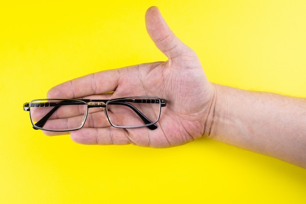 Photo glasses in hand