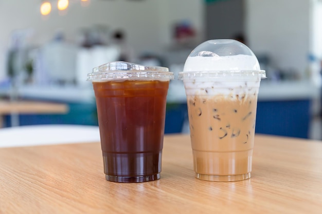 Glasses of iced coffee drinks on table Iced Cappuccino and iced americano