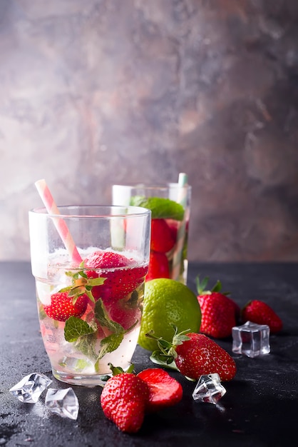 Glasses of lemonade with strawberries