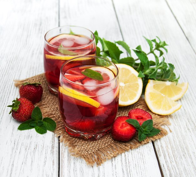 Glasses of lemonade with strawberries