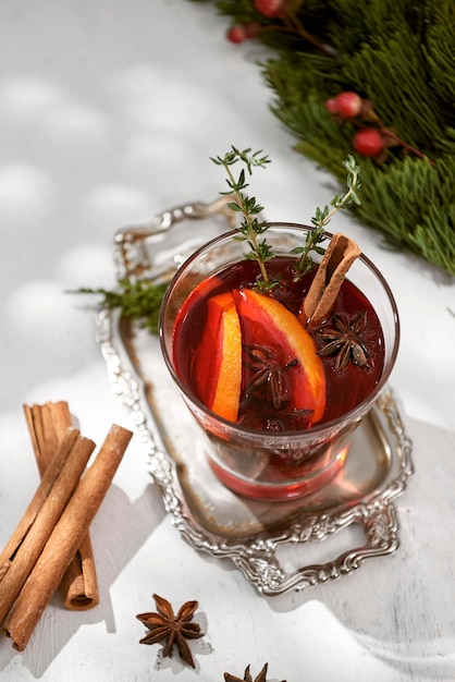 Glasses of mulled wine with orange and cinnamon Selective focus