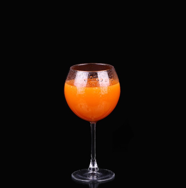 Photo glasses of organic juices isolated on the black