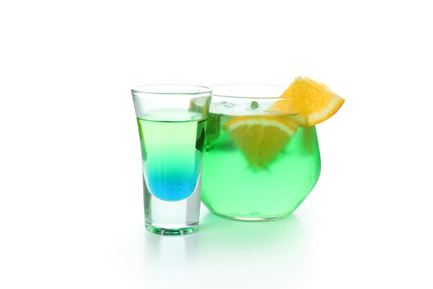 Glasses of party cocktails isolated on white background