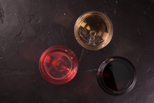 Glasses of red, pink and white wine