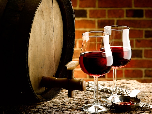 Glasses of red wine in a tasting cellar
