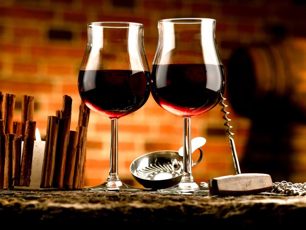 Glasses of red wine in a tasting cellar