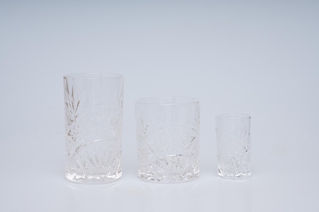 Glasses of various shapes on a white background