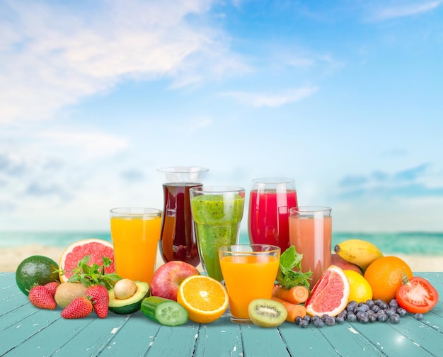 Glasses of various various juice with natural products