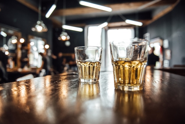 Glasses of whiskey on the table in the barbershop