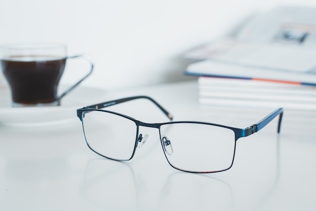 Photo glasses with book and coffee