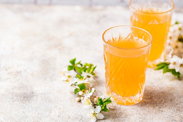 Glasses with fresh apple juice or cider 