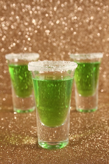 Glasses with a green cocktail