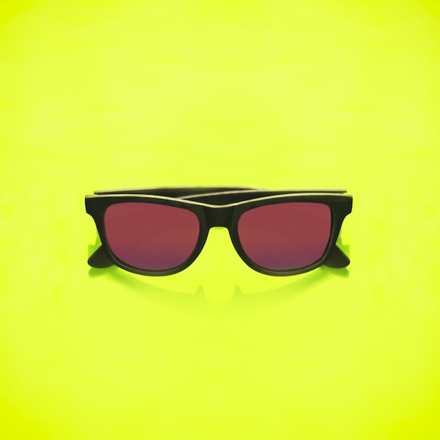 Glasses on a yellow background