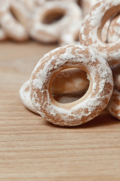 Glazed bagels on wooden table