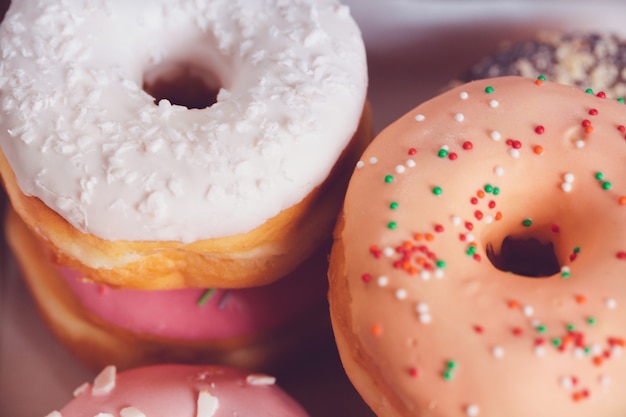 Glazed colored donuts