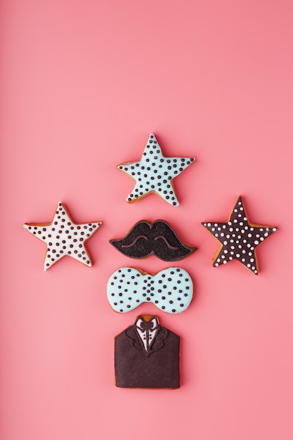 Glazed gingerbread in the form of a mustache, butterfly and tuxedo, stars men's set . Handmade cookies.