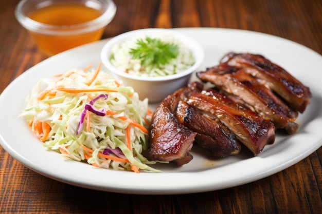 Glazed pork ribs with a side of homemade coleslaw