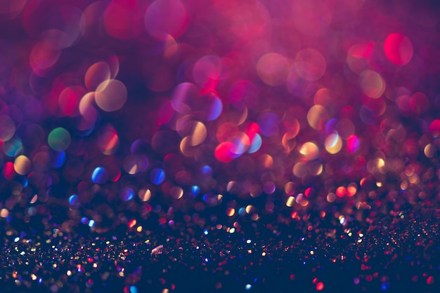 Glitter gold bokeh colorful blurred abstract background for anniversary