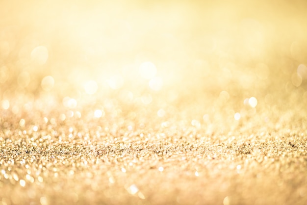 Glitter gouden bokeh kleurrijke wazig abstracte achtergrond voor verjaardag, jubileum, bruiloft