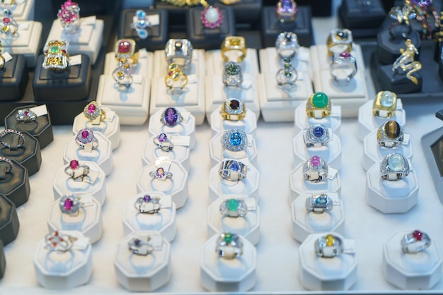 Photo glittering diamond rings on display in highend jewelry store