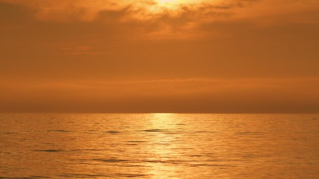 Glittering sea surface abstract background reflection of sunlight over sea surface texture