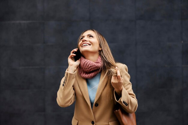 Global communications A woman talking on the phone