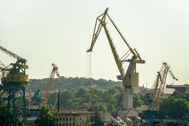 A global delivery, customer cargo shipping, the heavy\
industrial crane in the ship port