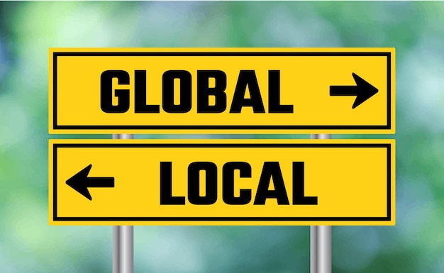 Global or local road sign on blur background