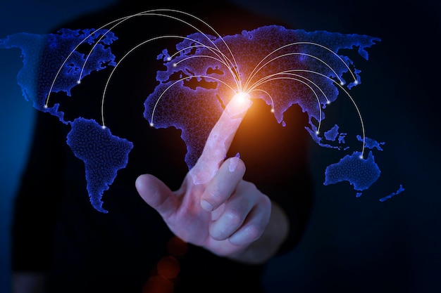 Global social and technology network communication concept A businessman touches a global web map