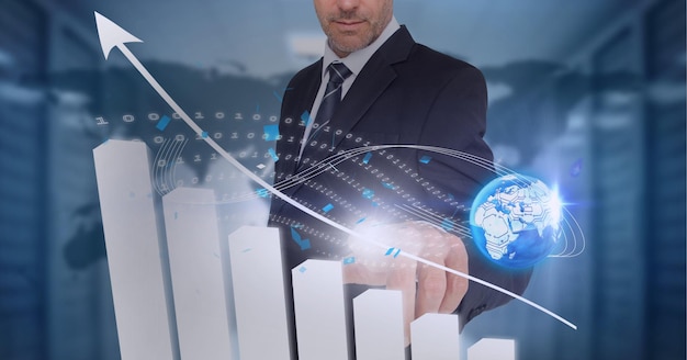 Globe and bar graphs over mid section of businessman touching invisible screen against world map