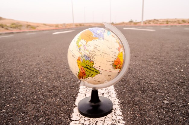 Globe Earth on an Asphalt Street