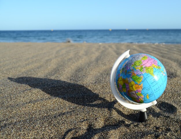 Globe Earth on the Beach