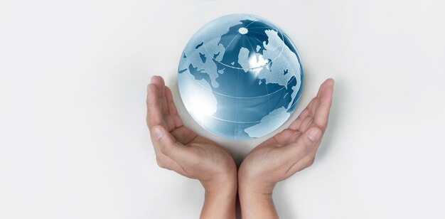 Globe ,earth in human hand, holding our planet glowing.