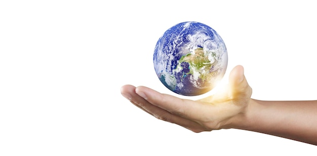 Globe in hand Earth energy saving concept Elements of this image furnished by NASA