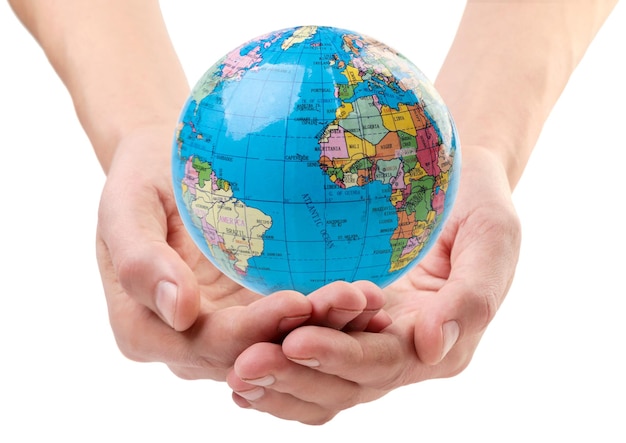 Globe in hands close-up on a white background, isolated. Earth Day