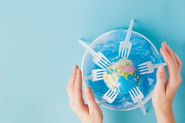 Globe on a plastic plate. The concept of ecology, land conservation