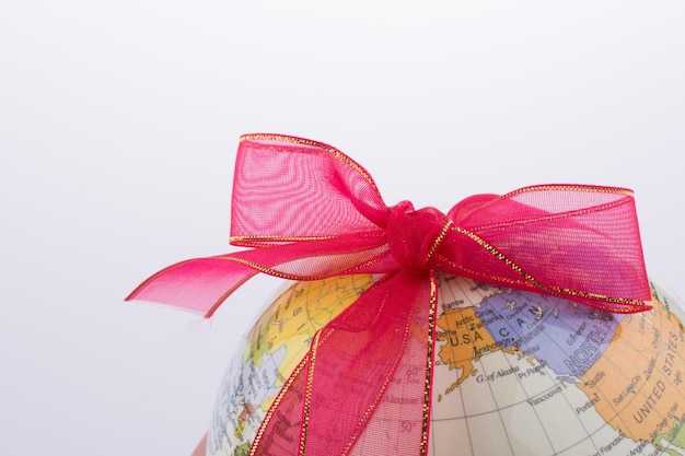 Globe tied with ribbon