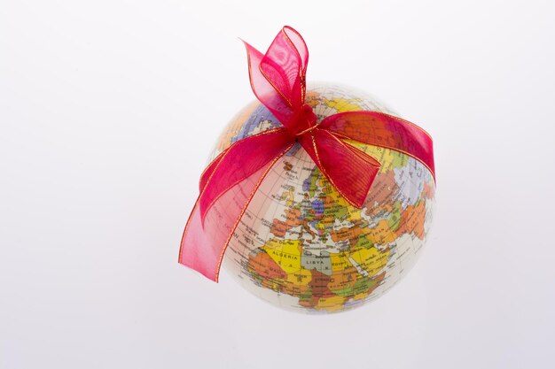 Globe tied with ribbon