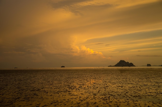 Gloomy tropical sunsetSunset over Water and IslandsThailand Krabi Province Ao Nang Beach