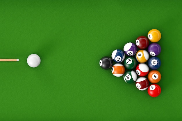 Glossy billiard balls set on a green billiards table