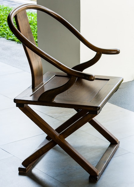 Glossy coating oak color wooden chair with armrest