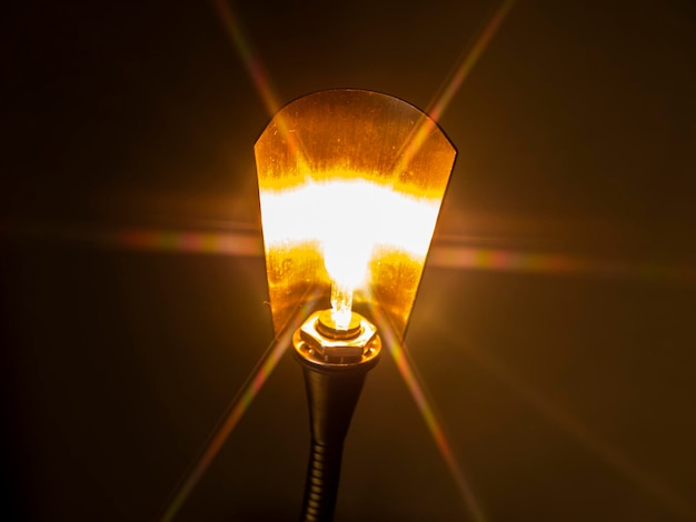 Glow of an electric halogen lamp lamp in the dark