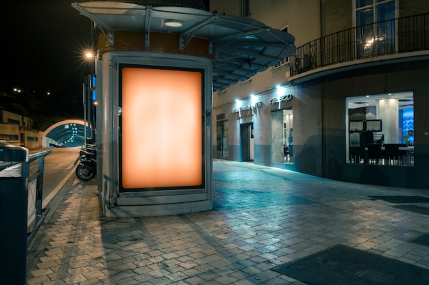 Photo glowing billboard for the advertisement on the sidewalk