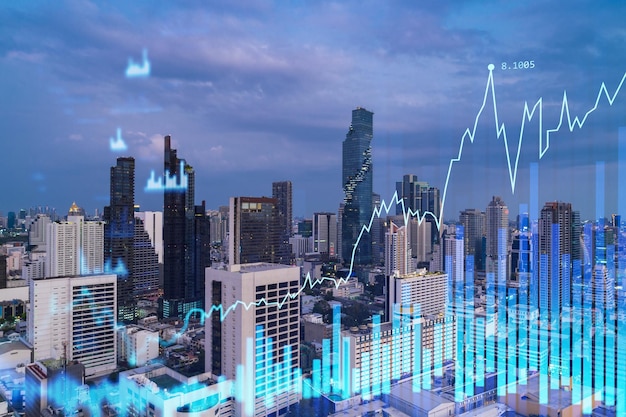 Glowing FOREX graph hologram aerial panoramic cityscape of Bangkok at sunset Stock and bond trading in Southeast Asia The concept of fund management Double exposure