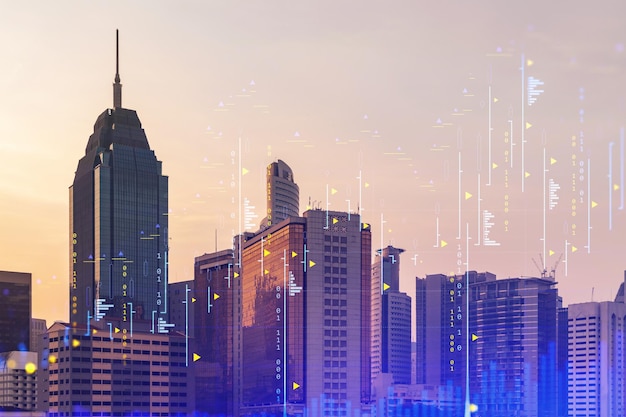 glowing forex graph hologram aerial panoramic cityscape of kuala lumpur at sunset stock and bond trading in kl malaysia asia the concept of fund management double exposure