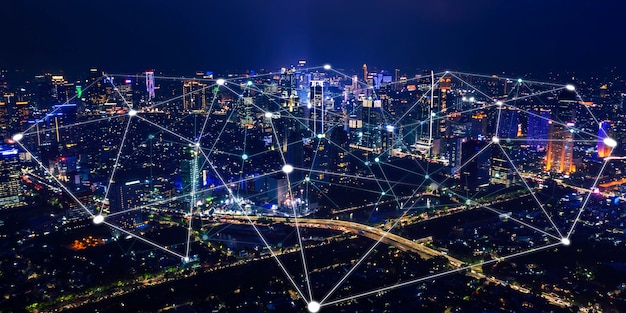 glowing modern buildings with network connection