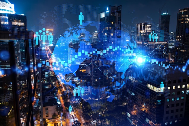 Glowing Social media icons on night panoramic city view of Bangkok Asia The concept of networking and establishing new connections between people and businesses Double exposure