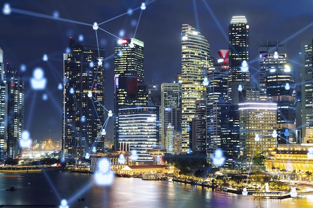 glowing social media icons on night panoramic city view of singapore asia the concept of networking and establishing new connections between people in businesses double exposure