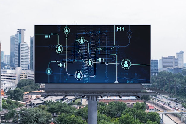 Glowing social media icons on road billboard over panoramic\
city view of kuala lumpur malaysia asia the concept of networking\
and establishing new connections between people and businesses in\
kl